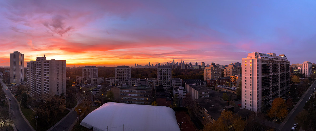 Red and magenta fill the whole sky above a dark skyline.