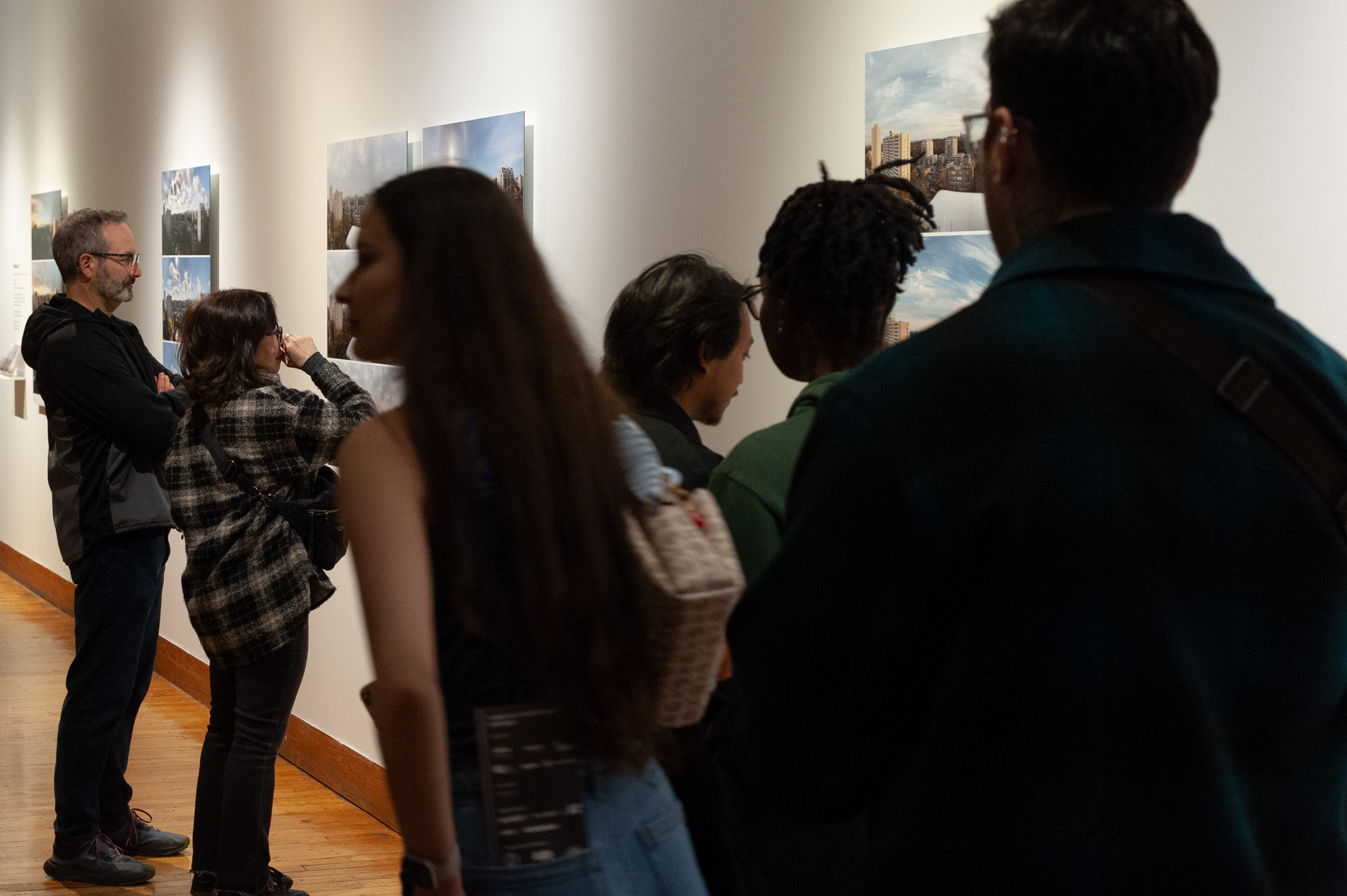 Visitors stand looking at the Shifts.