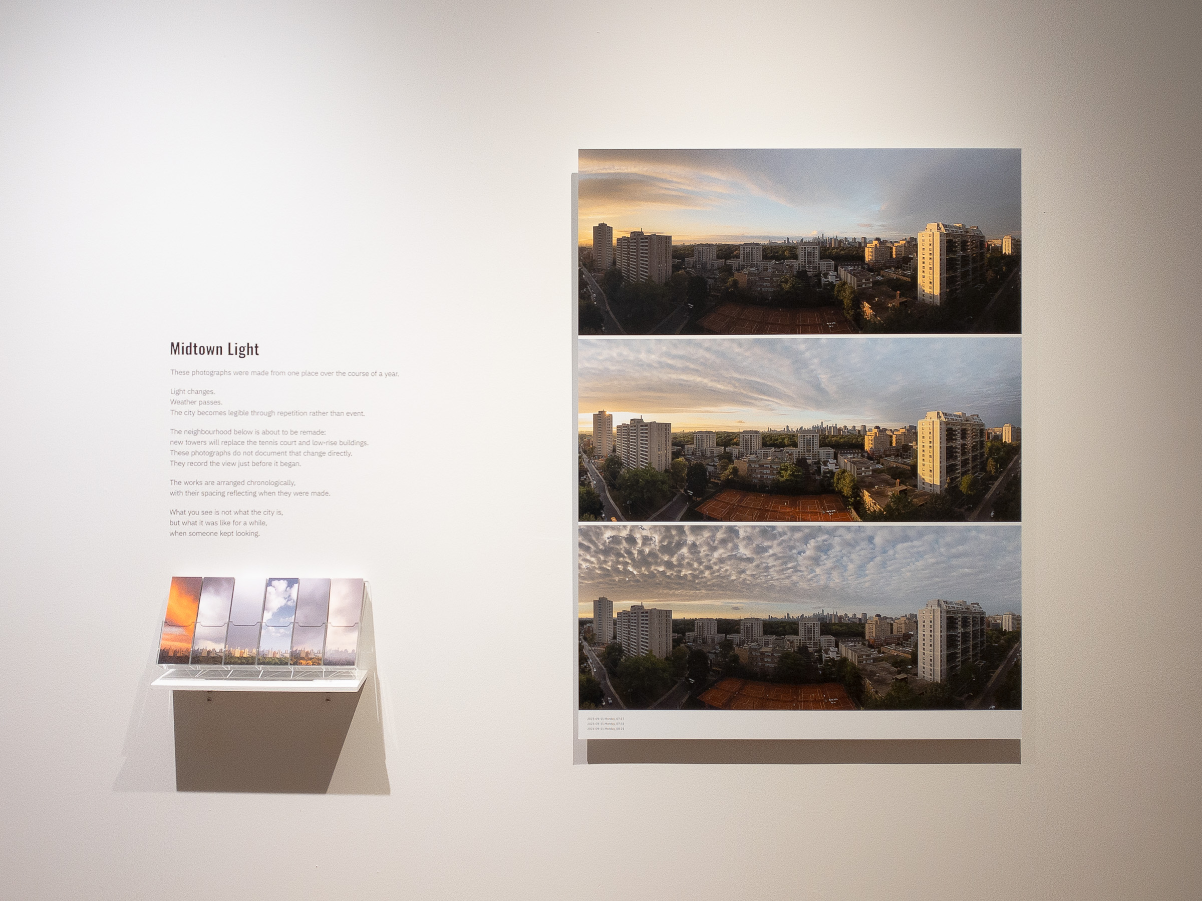Frontal view of the end of the wall: the project introduction, the bookmark holder, and the first Shift.